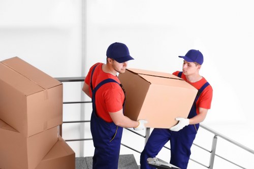 House removalists loading furniture in a Mayfair street