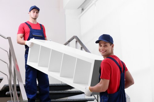 Office furniture and equipment being handled for a Mayfair move