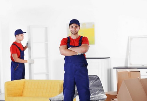 Trained removal staff using protective equipment during a move