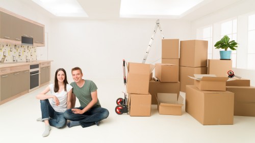 Supervisor reviewing safety checklist during a relocation job