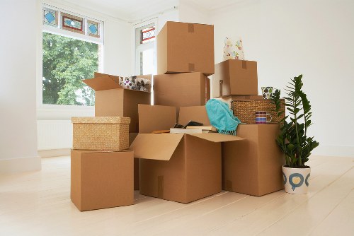 Loading furniture into a removals vehicle near Mayfair streets