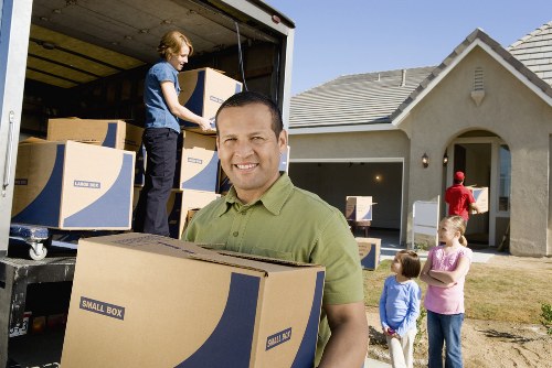 Careful packing of fragile household items for a Mayfair relocation